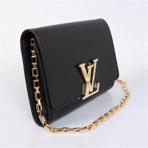 lv black leather clutch gold tassle|louis vuitton clutches for women.